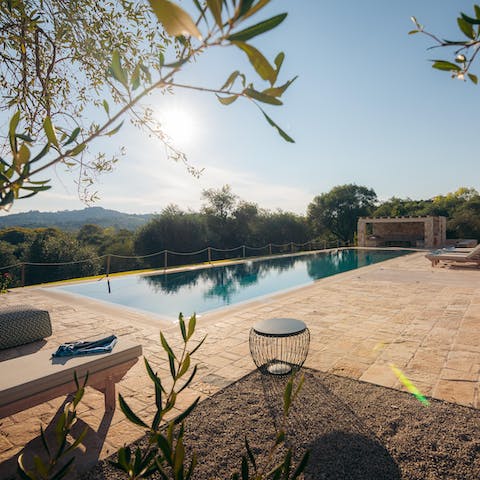 Lie back by the pool and soak up the surroundings