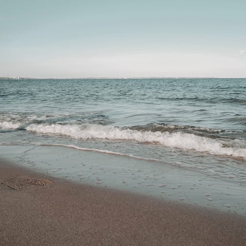 Stroll to Vourvourou beach and sink your feet into the sand