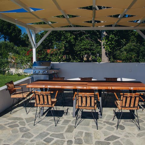 Light the barbecue and enjoy an alfresco meal on the covered terrace