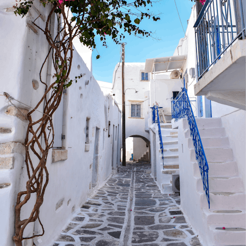 Stroll the cobbled streets of Parikia, before tucking into moussaka and souvlaki at a charming taverna
