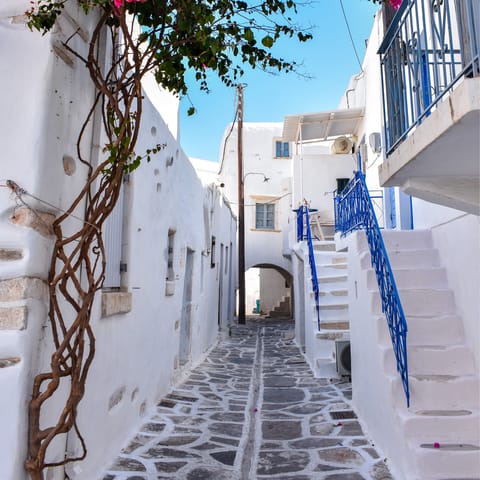 Stroll the cobbled streets of Parikia, before tucking into moussaka and souvlaki at a charming taverna