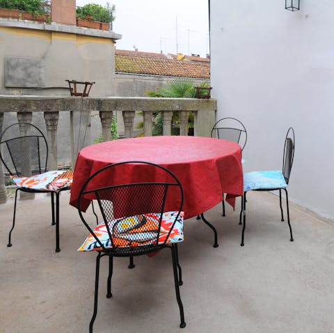 Enjoy a few Italian cocktails out on the terrace before heading out