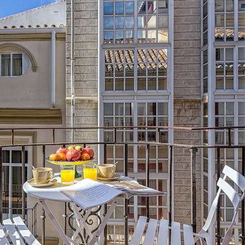 Sit out on the balcony with a cup of coffee and a good book