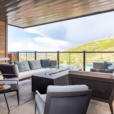 Gather round the firepit after a day of mountain adventures