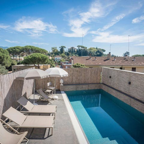 Take a dip in the shared swimming pool