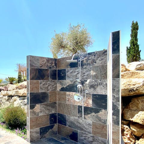 Enjoy an alfresco shower while you gaze out at gorgeous views of the surrounding landscape