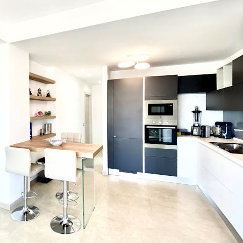 Cook up all your favourite meals in the fully-equipped kitchen