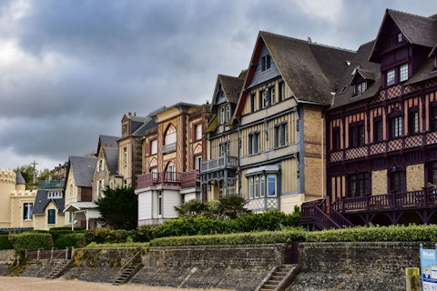 Discover Trouville's colourful fish market and belle époque villas nearby