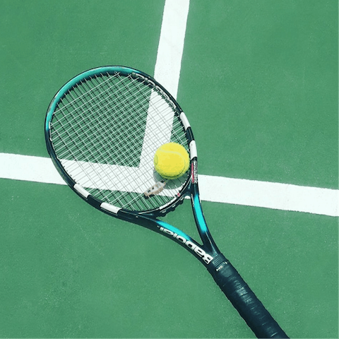 Book in a round of tennis at the nearby club within walking distance