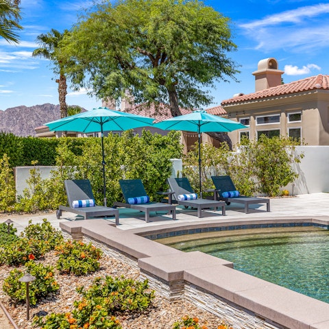 Take a break from the desert sun in the shade by the pool