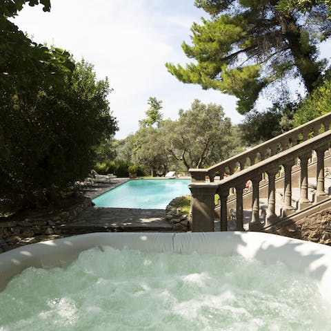 Unwind in the hot tub after taking a stroll through the private gardens