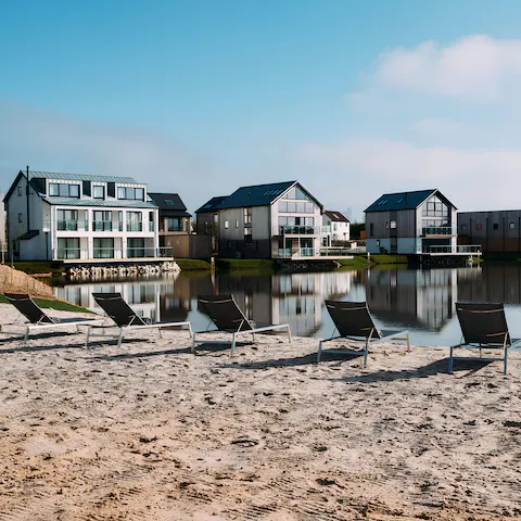 Relax on the estate's beach after visiting the on-site spa, a short walk away
