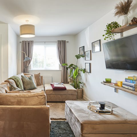 Curl up on the sofa with a book or watch a movie on the smart TV