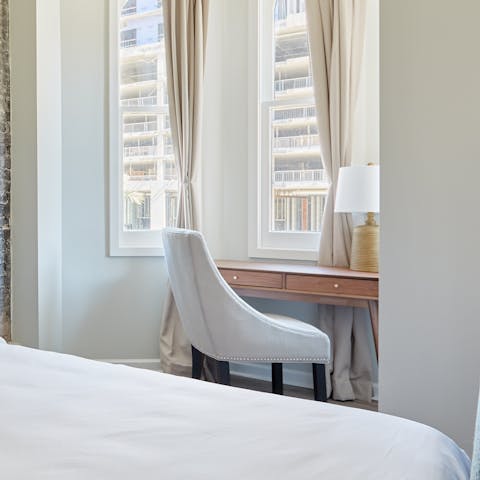 Catch up at the desk space while enjoying Big Easy views