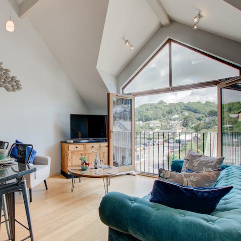Throw open the double doors and admire the beautiful riverside views