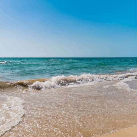 Wake up and dive into the refreshing waters off Netanya Beach, a few moments away