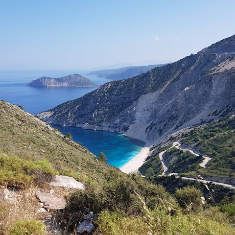 Spend the day on beautiful Myrtos Beach, a short drive away