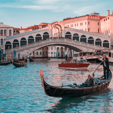 Explore Venice including the iconic Rialto Bridge, a short stroll away