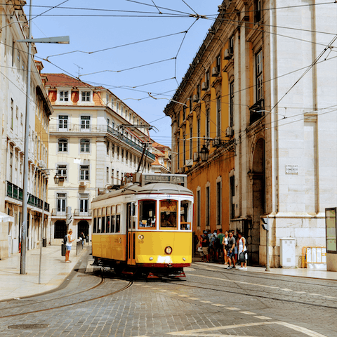 Jump on a city tram to explore historic Lisbon in style