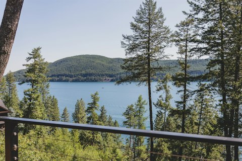 Enjoy incredible views across Whitefish Lake from the deck