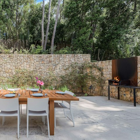 Set the table as the catch of the day sizzles on the barbecue