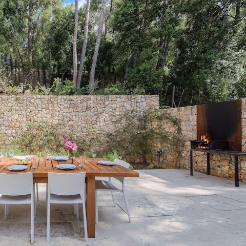Set the table as the catch of the day sizzles on the barbecue