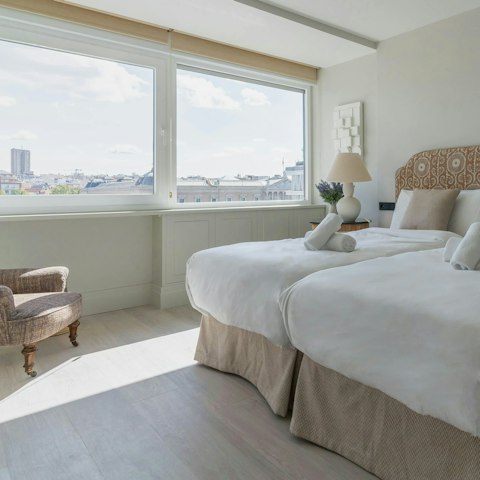 Wake up to views of the Plaza from the elegant bedroom