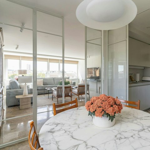 Lay the table for breakfast in the light-filled dining area