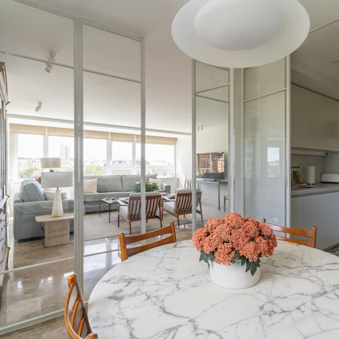 Lay the table for breakfast in the light-filled dining area