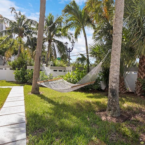 Hang out with a good book in the shared hammock