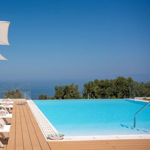 Find peace and stunning views from the swimming pool