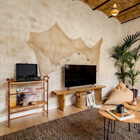 Put a record on or sit back with your favourite series on the comfortable sofa
