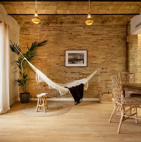 Hang out in the living room's hammock