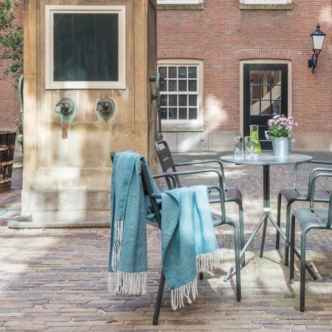 Sip coffee in the communal courtyard