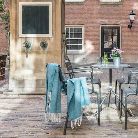 Sip coffee in the communal courtyard