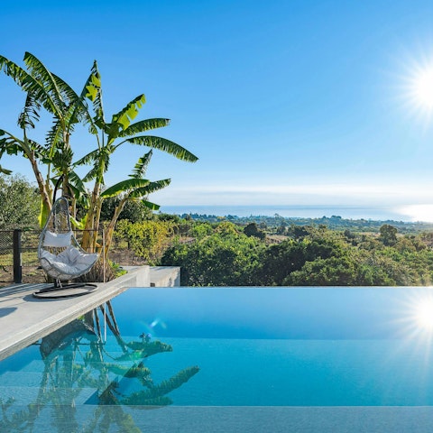 Sit back by the pool and bask in the Mediterranean views