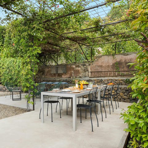 Dine with family and friends under the picturesque pergola
