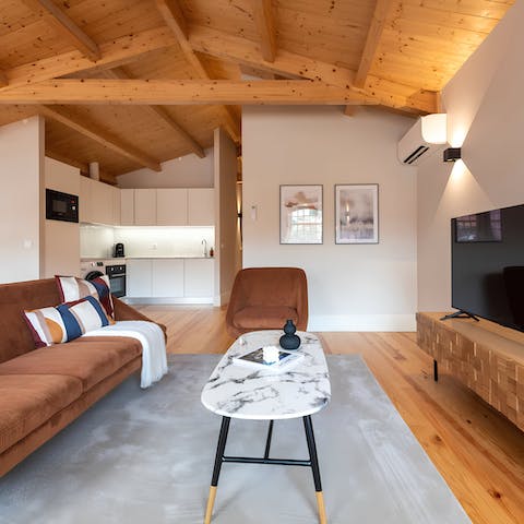 Kick your feet up beneath wood-beamed ceilings after exploring