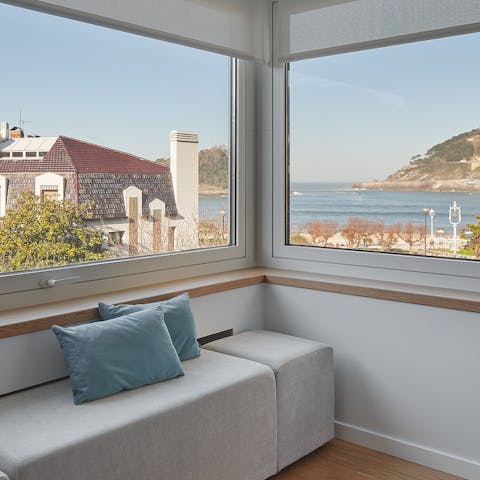 Take in the breathtaking views of La Concha Bay, right from the comfort of your window nook
