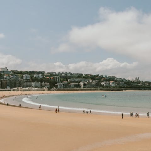 Enjoy the beauty of La Concha beach, a five-minute walk away