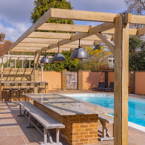 Fire up the pizza oven and serve up an alfresco feast here