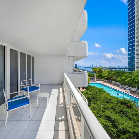 Sip an alfresco drink on the private balcony