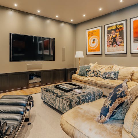 Gather for an atmospheric night at the movies in the home cinema