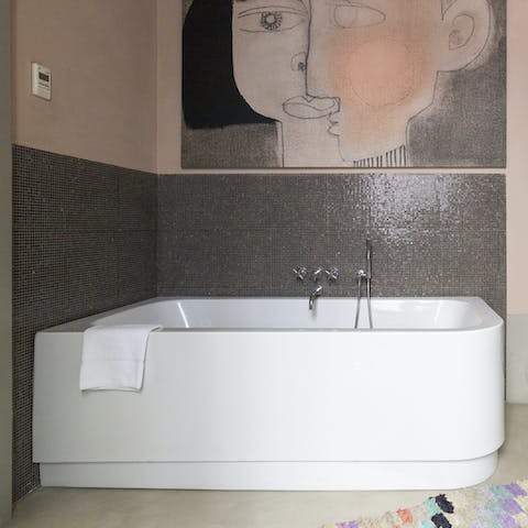 Fill the corner bath with bubbles and sink in for a long soak