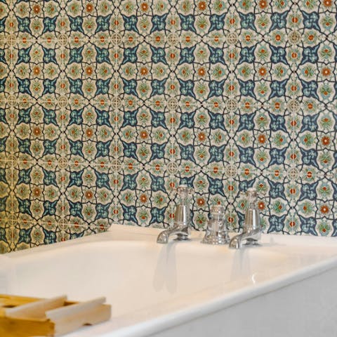 Sink into a hot bath in the main en-suite's tub