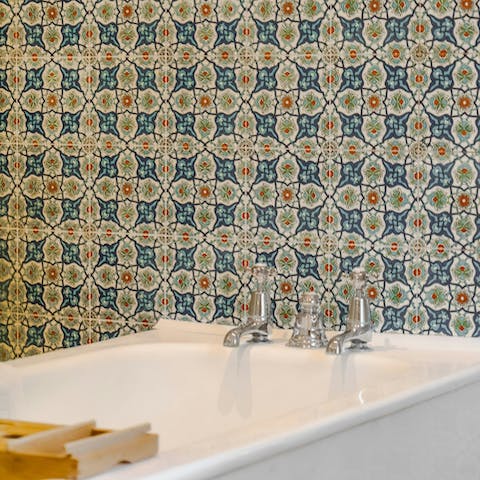 Sink into a hot bath in the main en-suite's tub