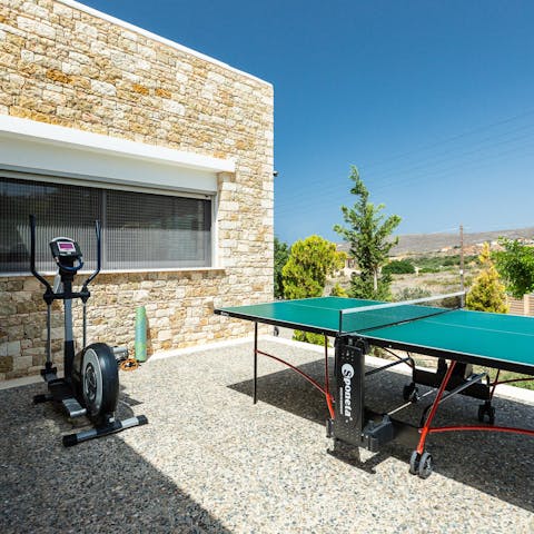 Get competitive over a game of ping pong in the sunshine 