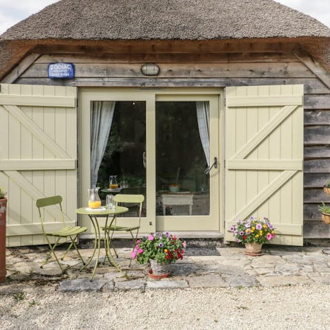 Enjoy a glass of cider on the private patio