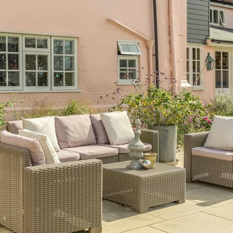 Pop open a bottle of sparkling to share in the outdoor lounge