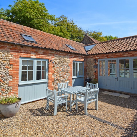 Take an evening drink out to the intimate courtyard